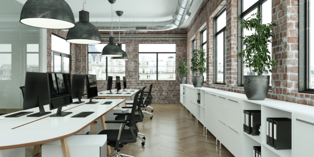 Ein modernes Büro mit Stühlen und Tische. Das W-Lan wurde dort ideal optimiert.