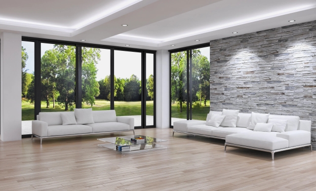 Ein modernes Wohnzimmer mit Smarthomesteuerung. Dank dem besseren WLAN lassen sich die alle funklöcher füllen.